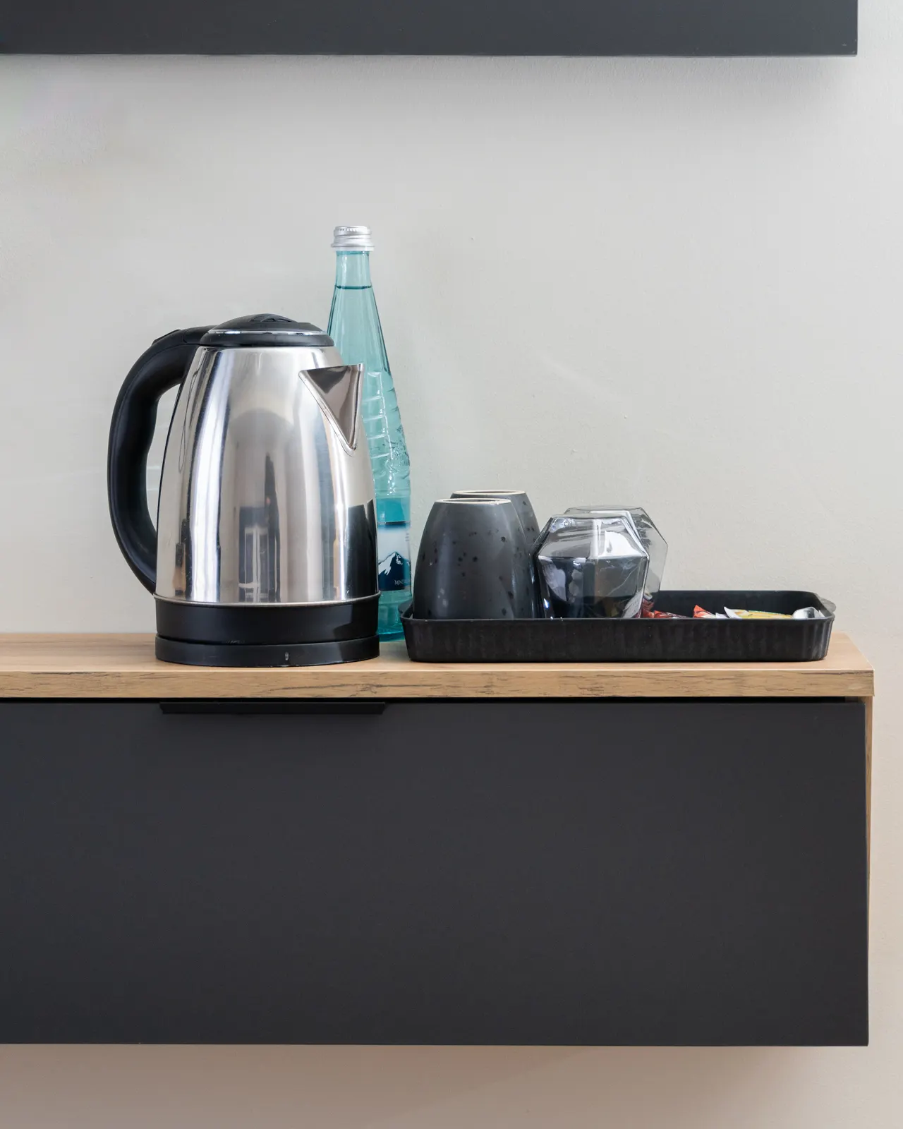 Kettle and tea tray on the room console